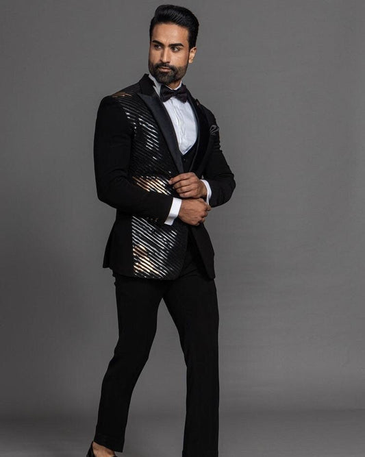 Black acrylic embroidered suit.